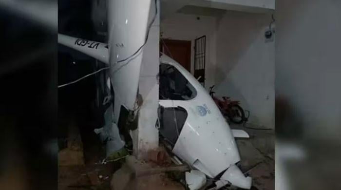 A small plane crashed into a residential building in India