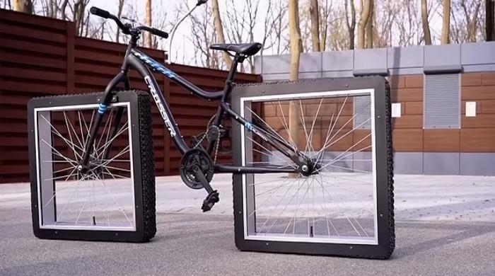 A unique bicycle with square wheels that you have never seen before