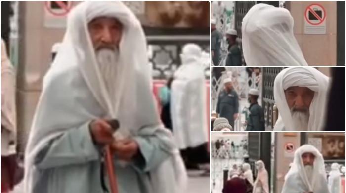 The video of Barzag carrying a cane in the Prophet’s Mosque went viral